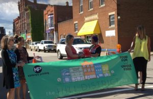 Ribbon knotting celebrates unity in Hill District ribbon knotting