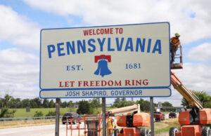 Governor Shapiro unveils new highway welcome signs & license plates celebrating Pennsylvania as the Birthplace of American Democracy PA welcome sign