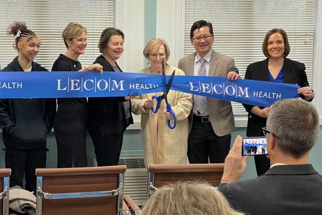 Members of Rev. Harry Johns' family and LECOM Health officials cut the ribbon on the new specialty hospice unit at LECOM Nursing and Rehabilitation Center, Erie, PA. Photo by Joel Natalie, TalkErie.com.