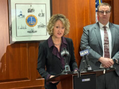 Mother of Erie fire victims charged Hirz