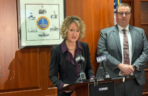 UPDATED: charges filed against parole officer in July Woodard shooting Hirz